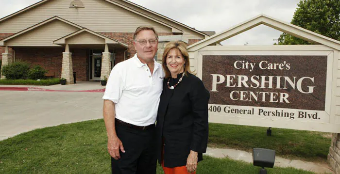 Larry Bross, founder of City Care, and his wife, Maisie, outside of the Pershing Center. (Courtesy of Bryce Daniels)