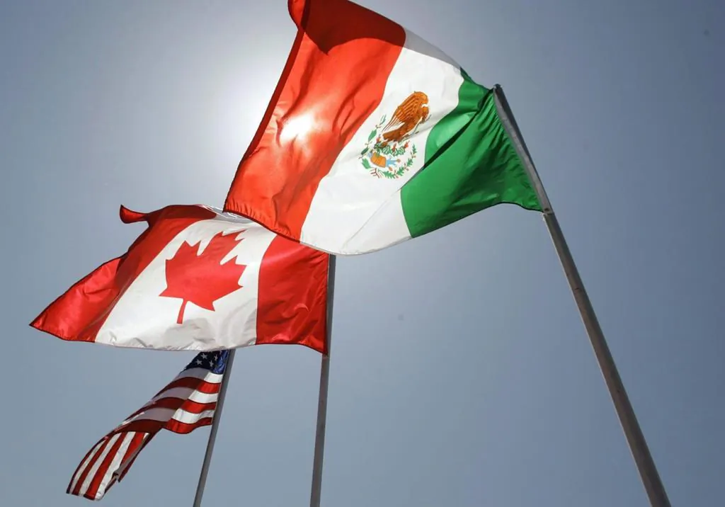 The flags of the United States, Canada, and Mexico. (The Canadian Press)