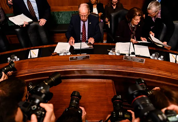 Republicans Advance Kavanaugh Nomination in Party-Line Vote