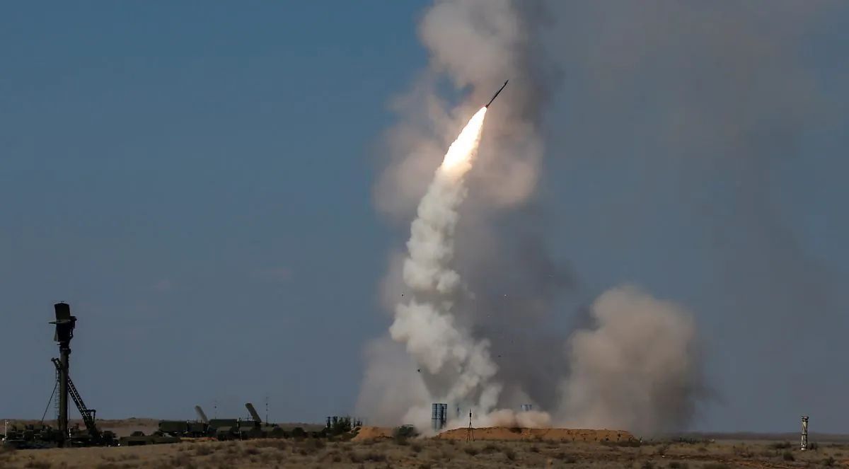 An S-300 air defense missile system launches a missile during the Keys to the Sky competition at the International Army Games 2017 at the Ashuluk shooting range outside Astrakhan, Russia, on Aug. 5, 2017. (Maxim Shemetov/Reuters)