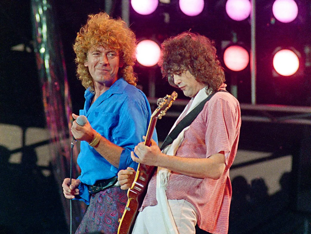 Led Zeppelin bandmates, singer Robert Plant (L), and guitarist Jimmy Page, reunite to perform for the Live Aid famine relief concert at JFK Stadium in Philadelphia, on July 13, 1985. (Amy Sancetta/AP)