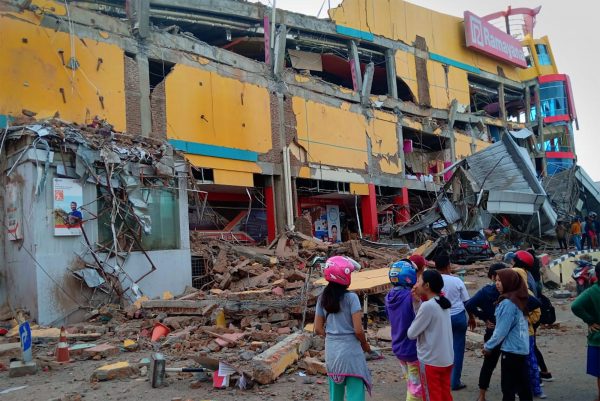 Residents front damaged shopping mall