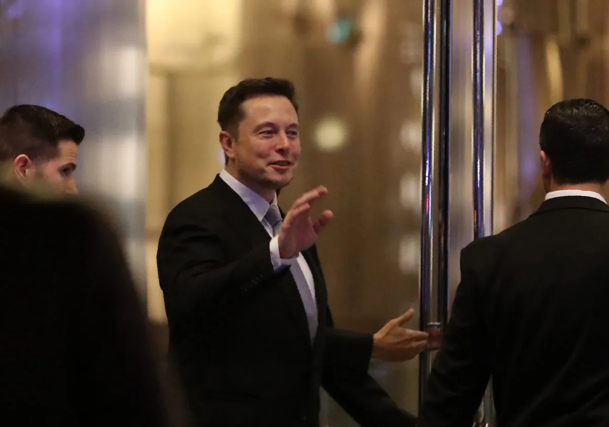 Elon Musk, the co-founder and chief executive of Electric carmaker Tesla, gestures during a ceremony in Dubai, on Feb. 13, 2017. (Karim Sahib/AFP/Getty Images)