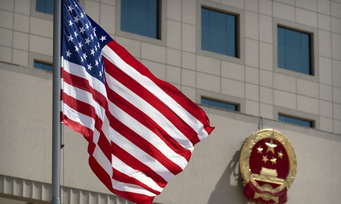 The American flag outside the Bayi Building before a welcome ceremony for U.S. Defense Secretary Jim Mattis in Beijing on June 27, 2018. (Mark Schiefelbein/ Reuters)