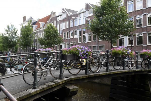 Bikes parked on a bridge crossing a canal in Amsterdam in this file photo.