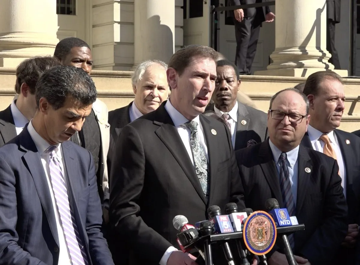 Chaim Deutsch (centre) speaks at a rally held to stand in solidarity with the Jewish community in front of New York City Hall on Oct. 31, 2018 (Marina Fatina/The Epoch Times).