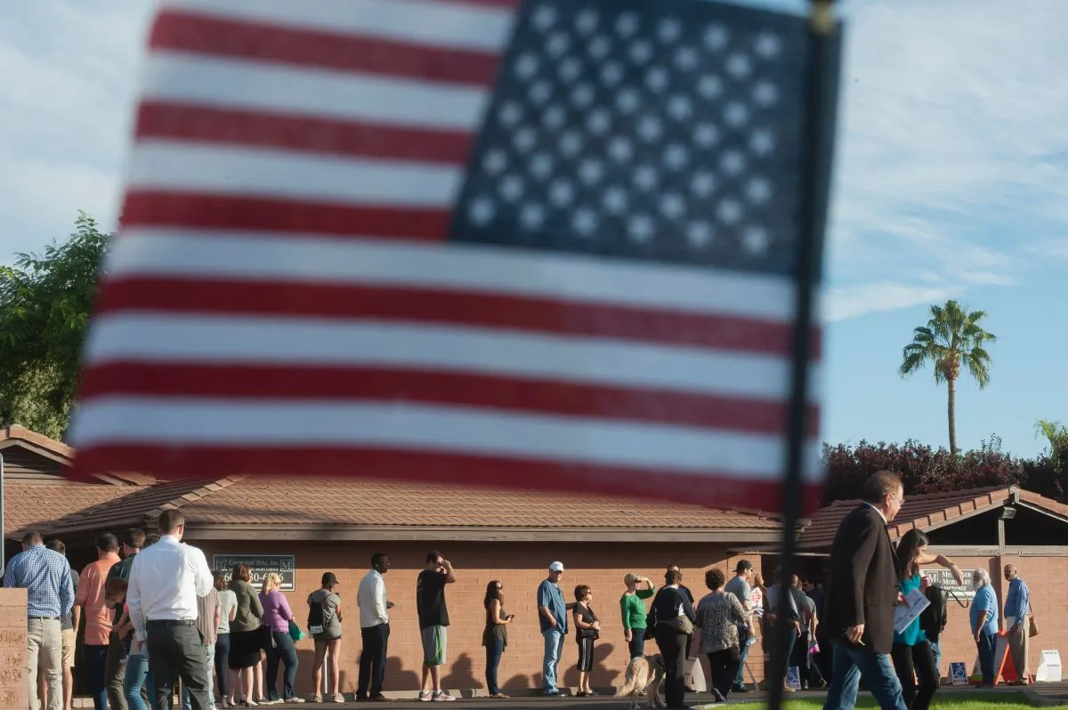 Voters wait in line in front of a polling station to cast their ballots in the U.S. presidential election in Scottsdale, Arizona on Nov. 8, 2016. (Laura Segall/AFP/Getty Images)