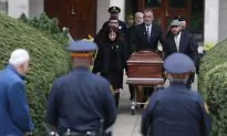 Pittsburgh Synagogue Shooting Suspect Faces New Charges as Funerals Continue