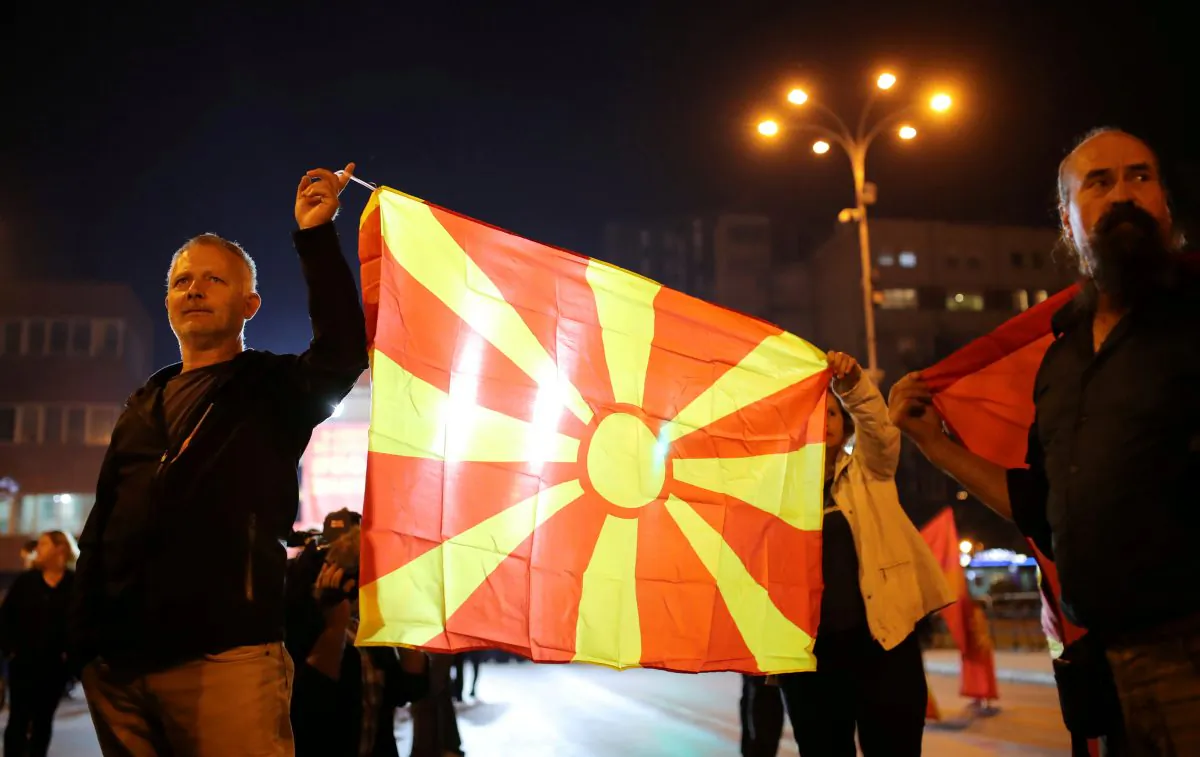 Protesters shout out slogans about boycotting the referendum on changing the country's name that would open the way for it to join NATO and the European Union in Skopje, Macedonia, on Sept. 30, 2018. (Reuters/Marko Djurica)
