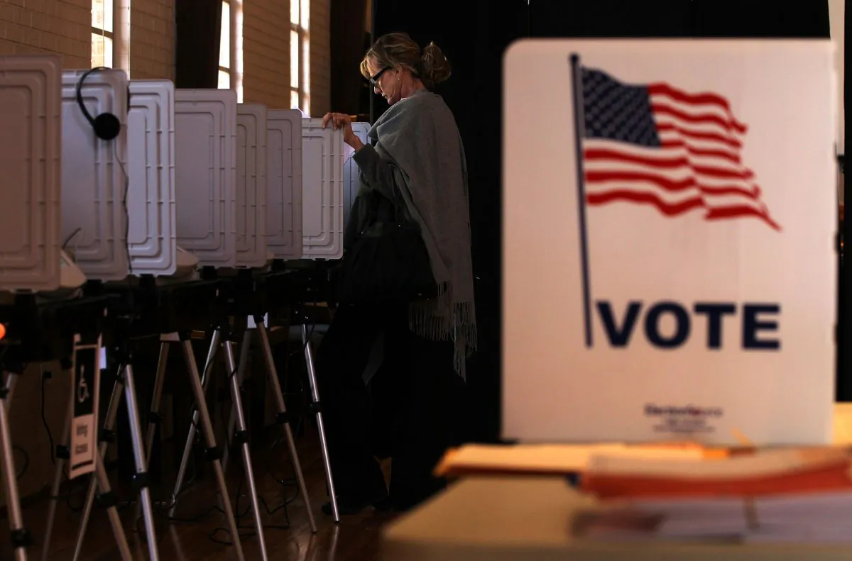A voter casts her vote at a polling station in St Andrew Presbyterian Church in Sandy Springs, Ga., on March 6, 2012. (Alex Wong/Getty Images)