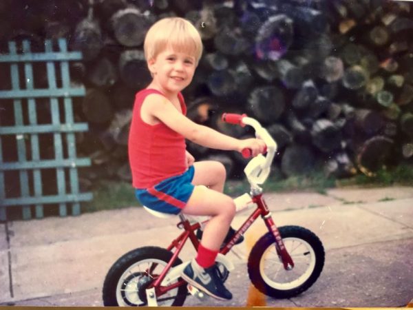 A young Marcus Soutra on his bicycle