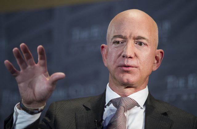 Jeff Bezos, Amazon founder and CEO, speaks at The Economic Club of Washington's Milestone Celebration in Washington, on Sept. 13, 2018. (AP Photo/Cliff Owen)