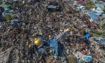 Scale of Indonesian Disaster Emerges but Rescuers Hold Hope for Survivors