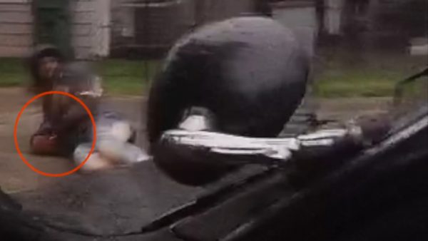 suspect holding what seems to be a gun