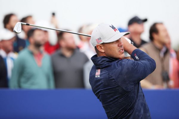 Brooks Koepka tees off in Paris