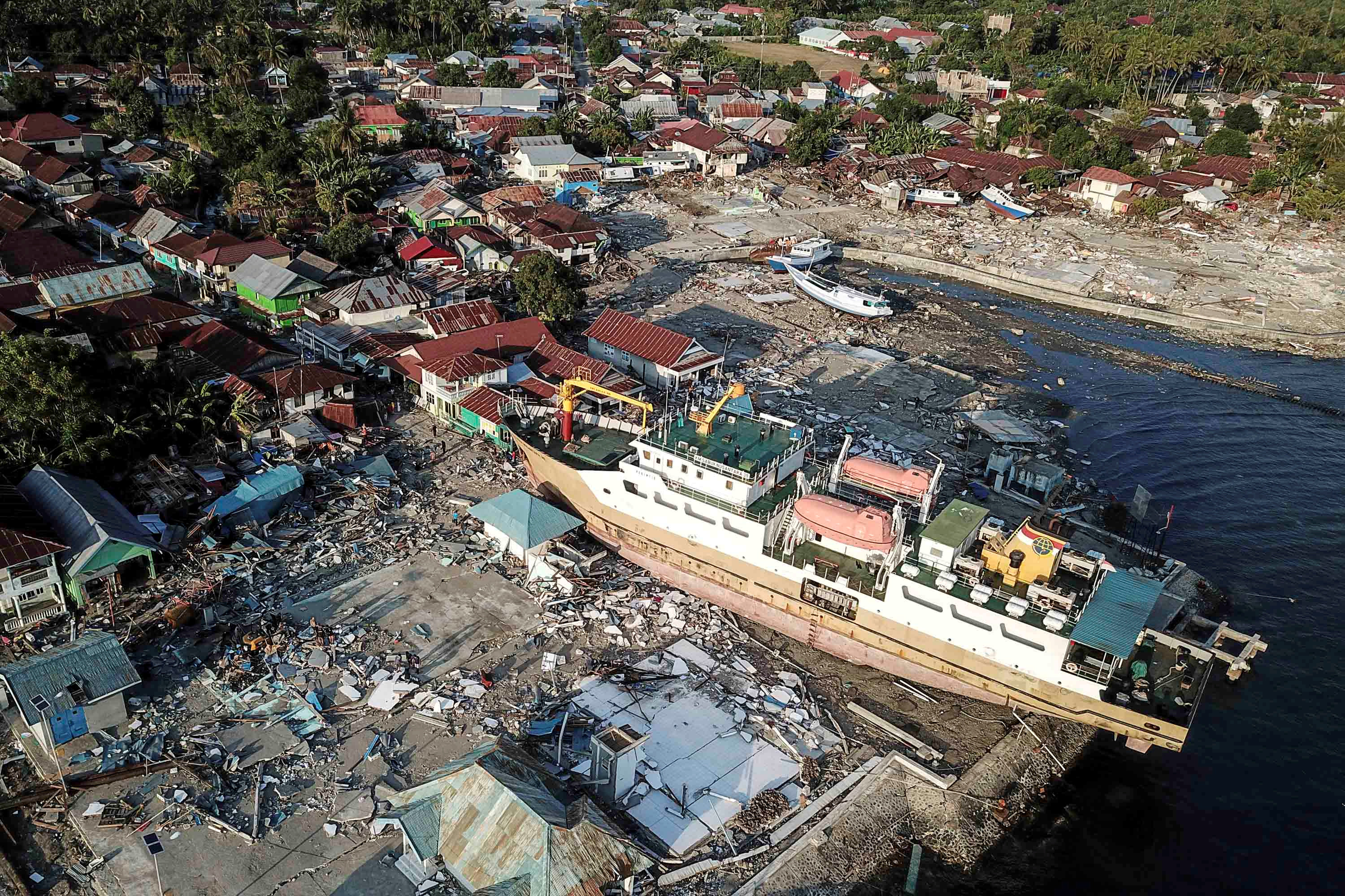 Ship stranded on the shore after earthquake, Indonesia