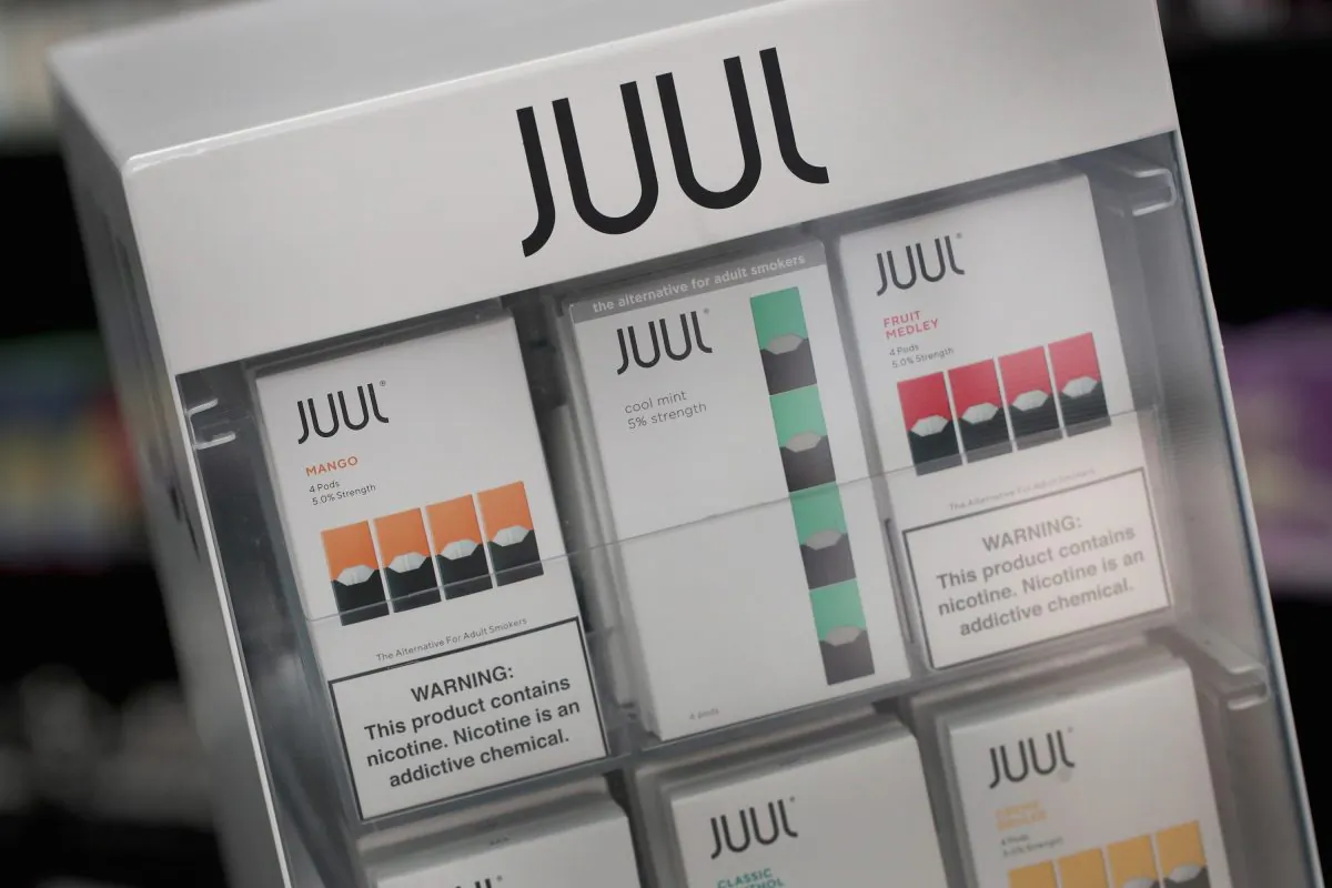 Electronic cigarettes and pods by Juul, the nation's largest maker of vaping products, are offered for sale at the Smoke Depot on September 13, 2018 in Chicago, Illinois. (Scott Olson/Getty Images)
