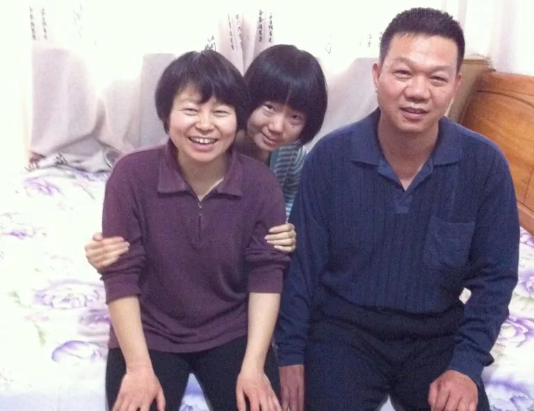 Fu Xinge (right) with his wife (left) and daughter Eva (center) in Shijiazhuang, China in 2013. (Photo provided by Eva Fu)