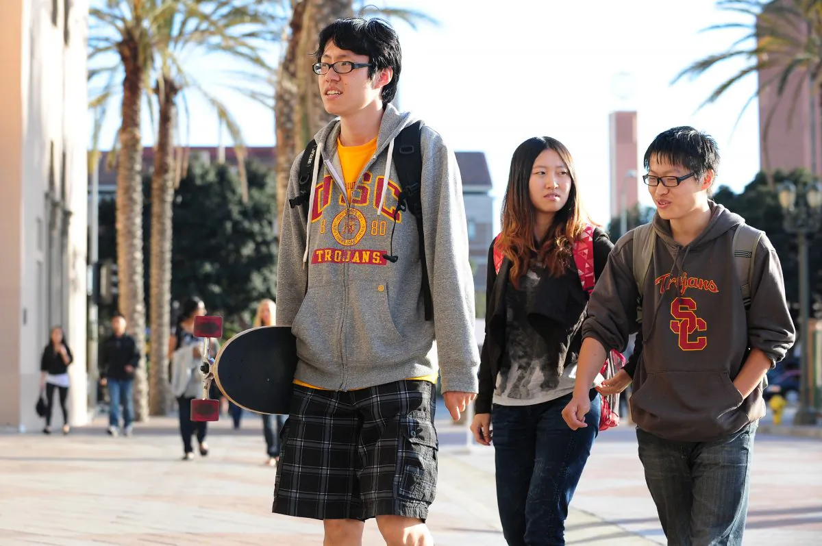 USC students on their way to attend a memorial service on April 18, 2012 in Los Angeles, California (FREDERIC J. BROWN/AFP/Getty Images)