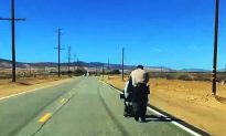 LA Deputies Push Woman’s Stalled Electric Wheelchair
