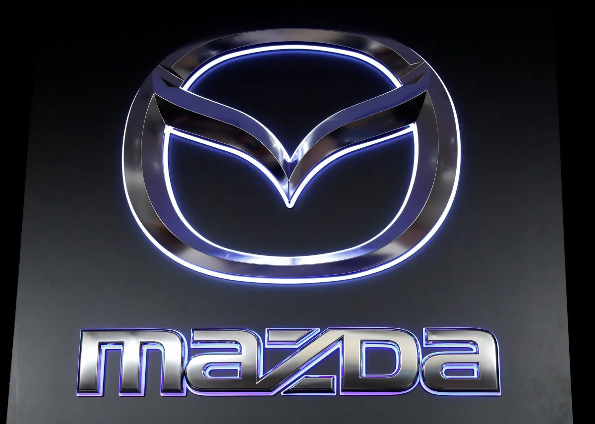 The logo of Mazda Motor Corp. is displayed at the company's news conference venue in Tokyo, Japan May 11, 2018. (Kim Kyung-Hoon/Reuters)