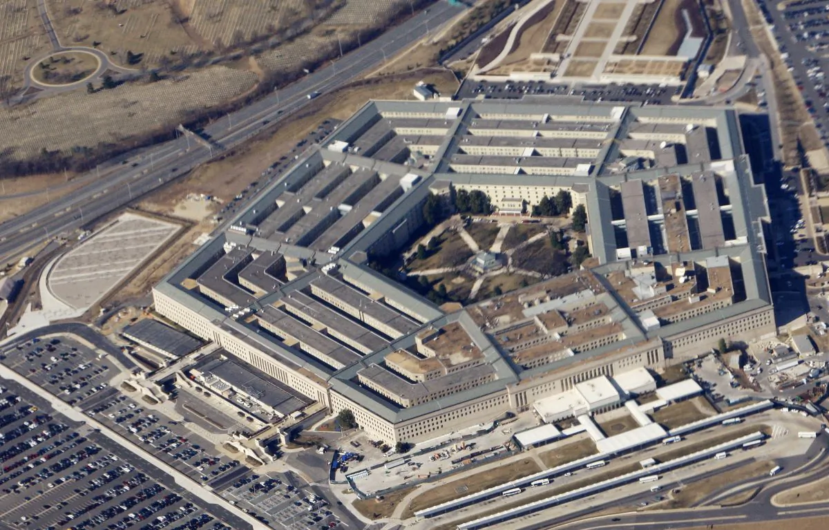 File photo of the Pentagon, as seen from Air Force One, taken on Feb. 12, 2009. The Pentagon says the U.S. is offering to put its cyber-warfare capabilities to use on behalf of its NATO allies. Officials planned to announce it in the coming days as U.S. Defense Secretary Jim Mattis attends a meeting of NATO defense ministers in Brussels on Oct. 3-4. (AP Photo/Charles Dharapak, File)
