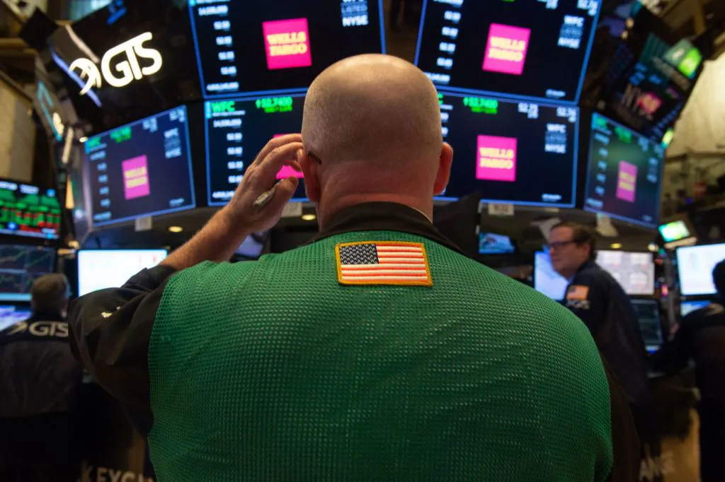 Traders work on the floor at the closing bell of the Dow Industrial Average at the New York Stock Exchange in New York on Oct. 3, 2018.(BRYAN R. SMITH/AFP/Getty Images)