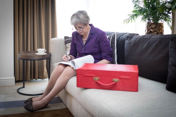 Britain's Prime Minister Theresa May prepares her keynote speech in her hotel room
