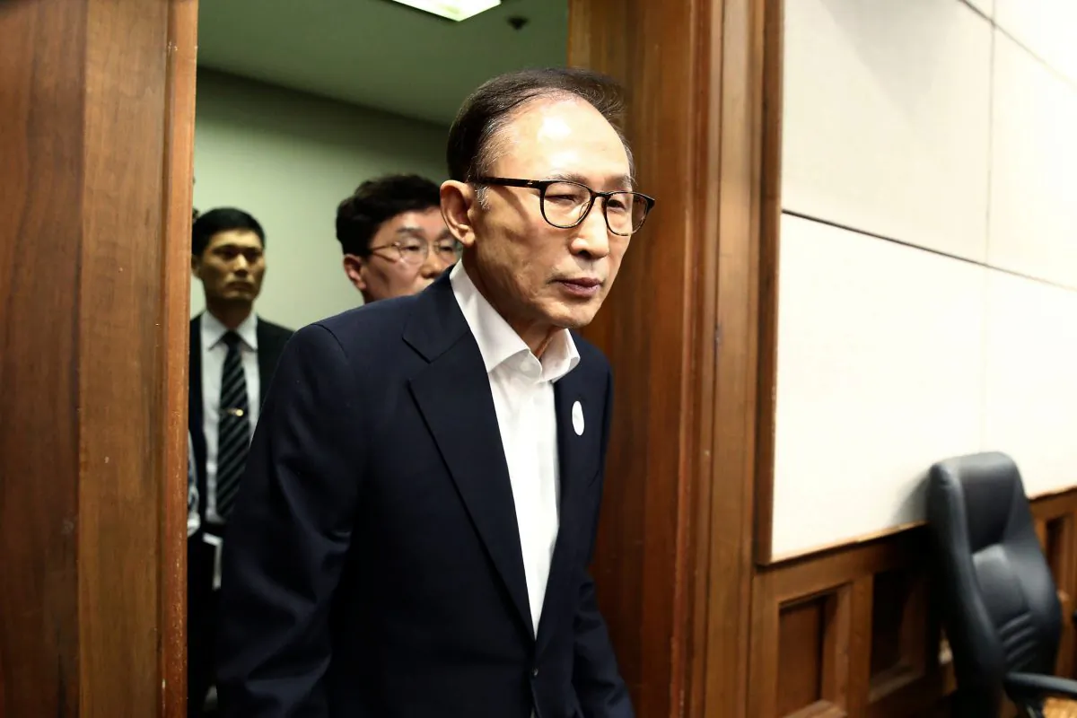 Former South Korean President Lee Myung-Bak appears for his first trial at the Seoul Central District Court in Seoul, South Korea, on May 23, 2018. (Chung Sung-Jun/Pool/Reuters)