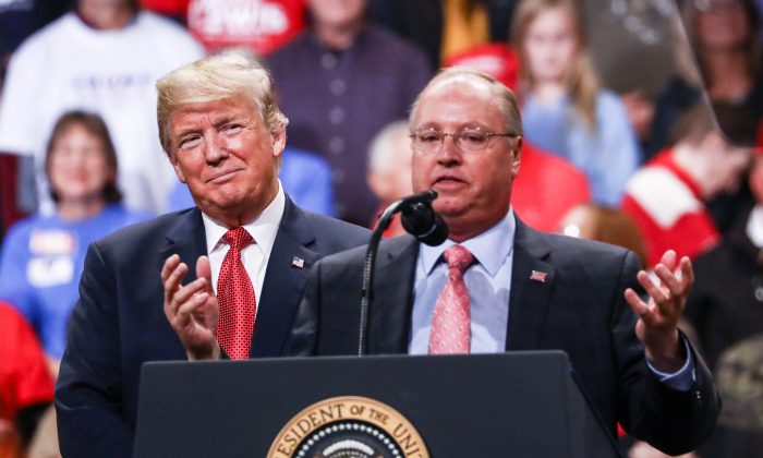 President Donald Trump and GOP congressional candidate Jim Hagedorn at a Make America Great Again rally in Rochester, Minn., on Oct. 4, 2018. (Charlotte Cuthbertson/The Epoch Times)