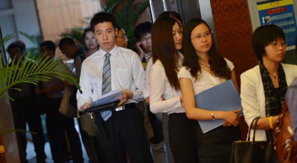 Unemployed Chinese graduates at a job fair in Beijing.