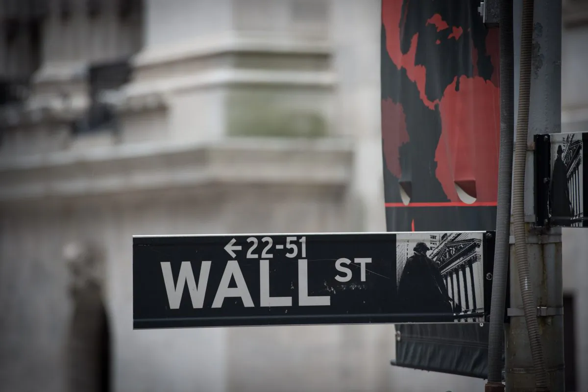 The Wall street sign near the New York Stock Exchange on Nov. 9, 2016. (BRYAN R. SMITH/AFP/Getty Images)