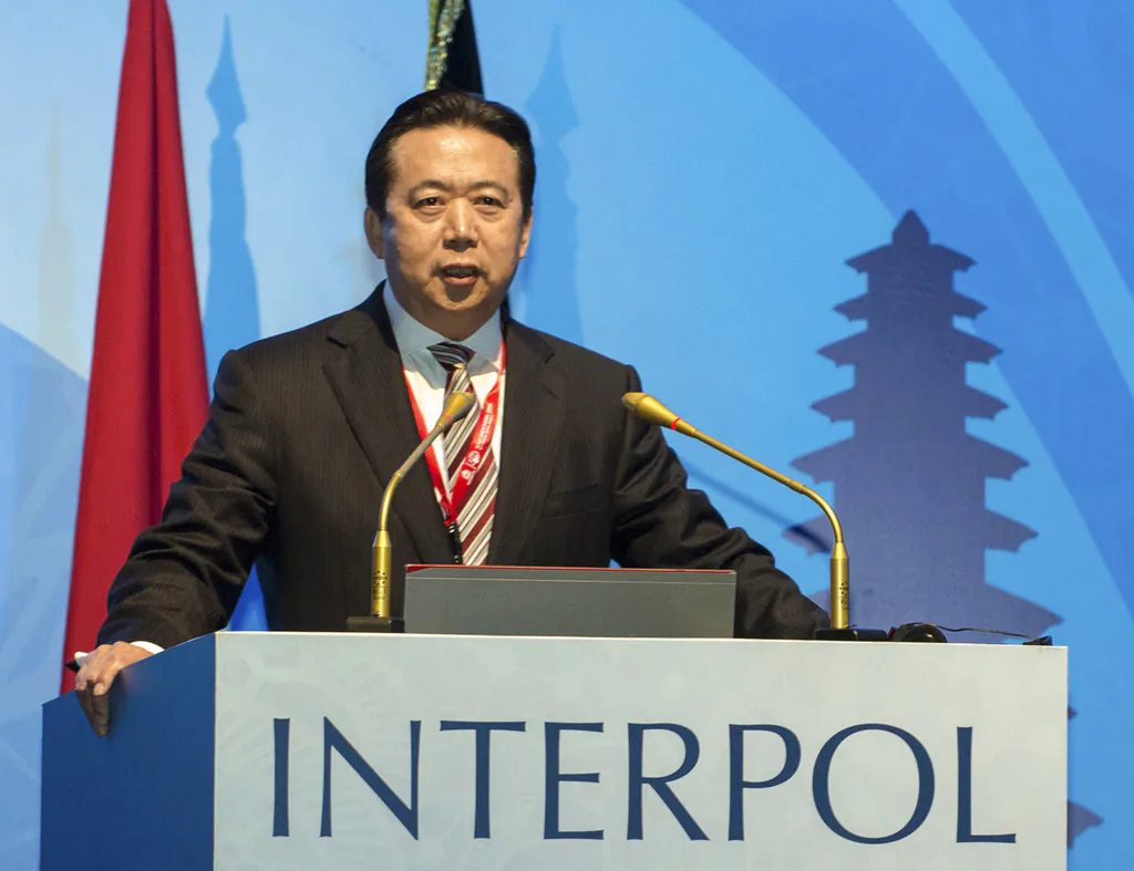 Meng Hongwei delivers a campaign speech at the 85th session of the general assembly of the International Criminal Police Organization (Interpol), in Bali, Indonesia on Nov. 10, 2016. (Du Yu/Xinhua via AP)In a statement posted on a government website Monday, Oct. 8, 2018, the authorities said Meng Hongwei, China's vice minister for public security, was being investigated due to his own "willfulness and for bringing trouble upon himself." (Du Yu/Xinhua via AP, File)