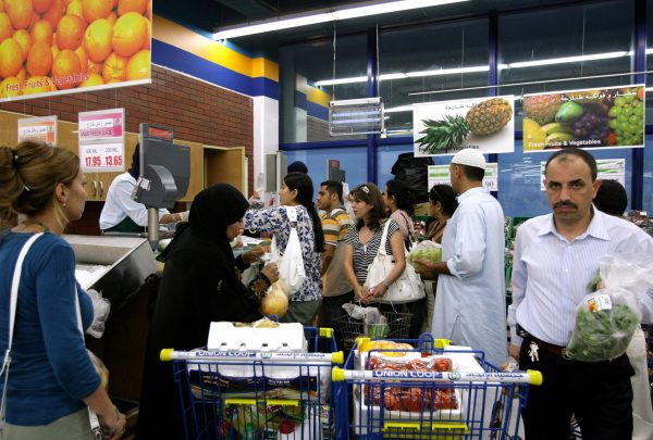 Emiratis and foreigners shop at a supermarket in Dubai in this file photo.