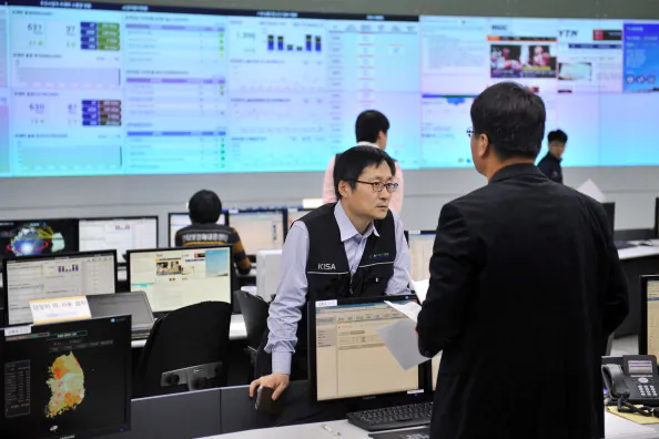 Members of the Korea Internet Security Agency check on cyber attacks at a briefing room in Seoul on March 20, 2013. (Jung Yeon-Je/AFP/Getty Images)