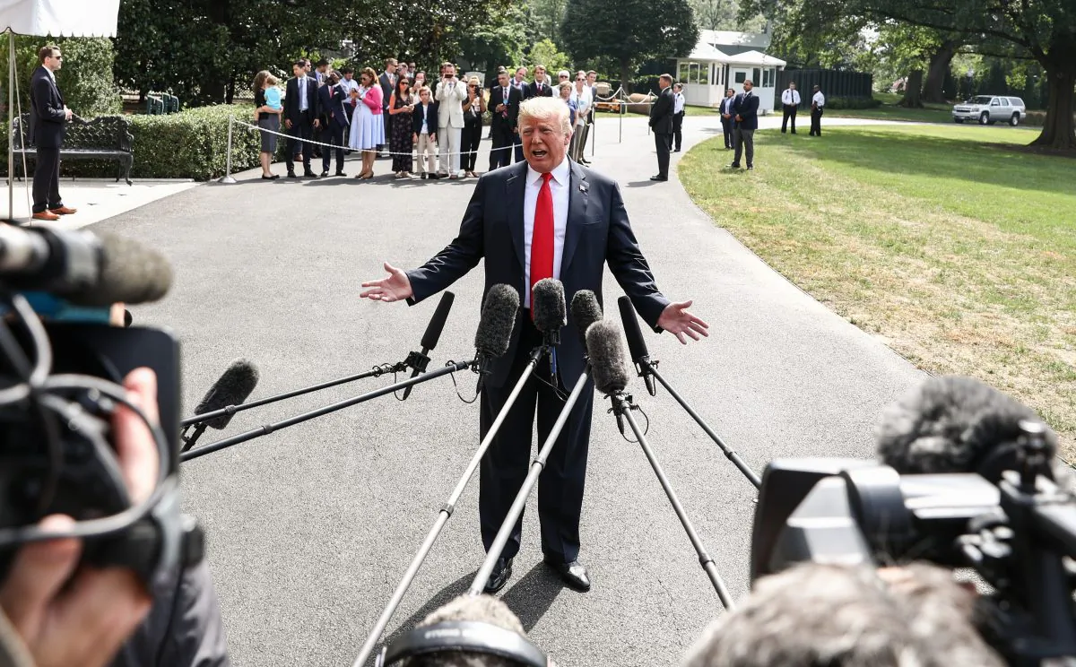 President Donald Trump talks to the media before leaving to Bedminster, N.J., at the White House in Washington on Aug. 17, 2018. (Samira Bouaou/The Epoch Times)