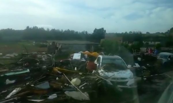 Cars and debris seen road