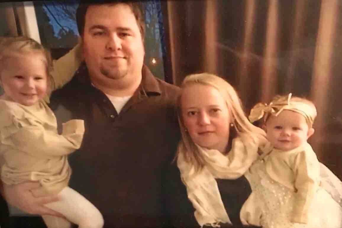 Adam Jackson and wife Abigail with two children