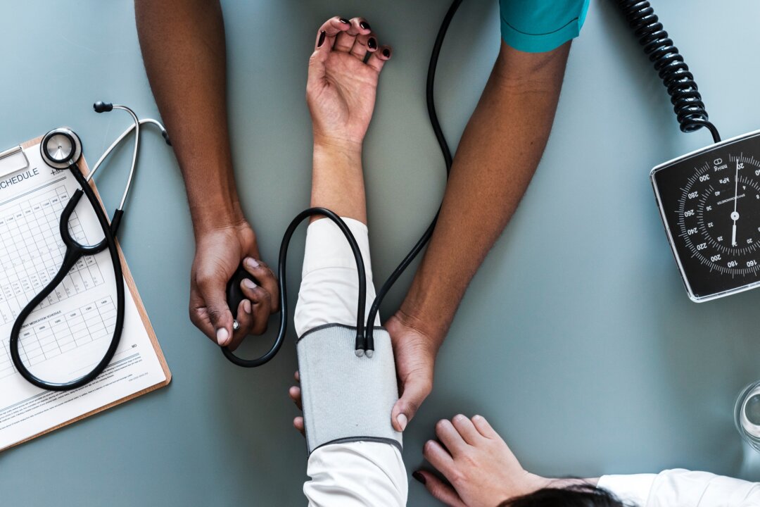 The Centers for Medicare and Medicaid predicts that health insurance premiums will, on average, go down in 2019. (Rawpixel/Unslplash)