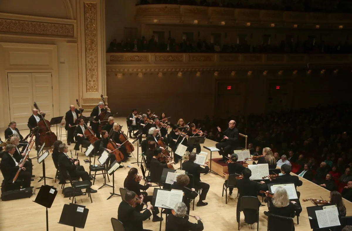 Mozart's symphony No. 41 in C, also known at the "Jupiter" symphony, is likely the last in a series of three symphonies of a triptych. Orchestra of St. Luke's performing Mozart's "Jupiter" at Carnegie Hall on Feb. 7, 2018. (Steve J. Sherman)