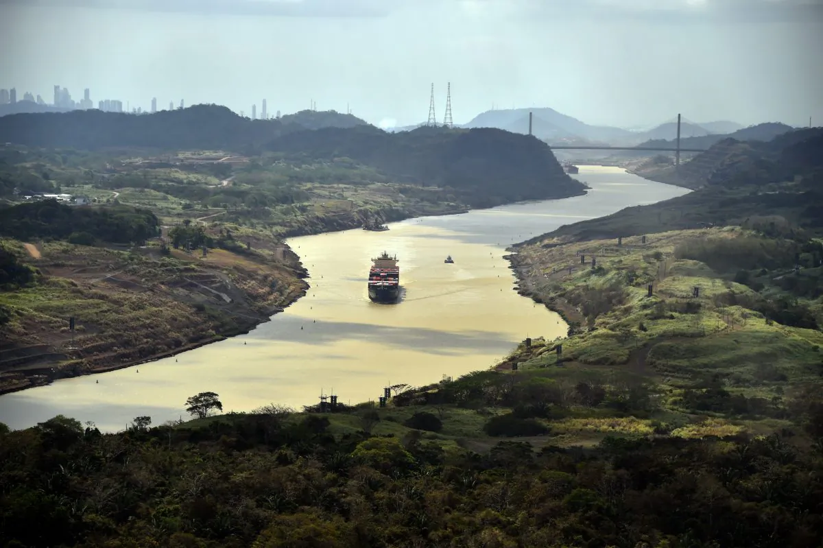 A merchant ship sails along the Panama Canal, in this file photo. China is continuing its push to displace U.S. influence in the region, and already has put parts of the Panama Canal under its control. RODRIGO ARANGUA/AFP/Getty Images