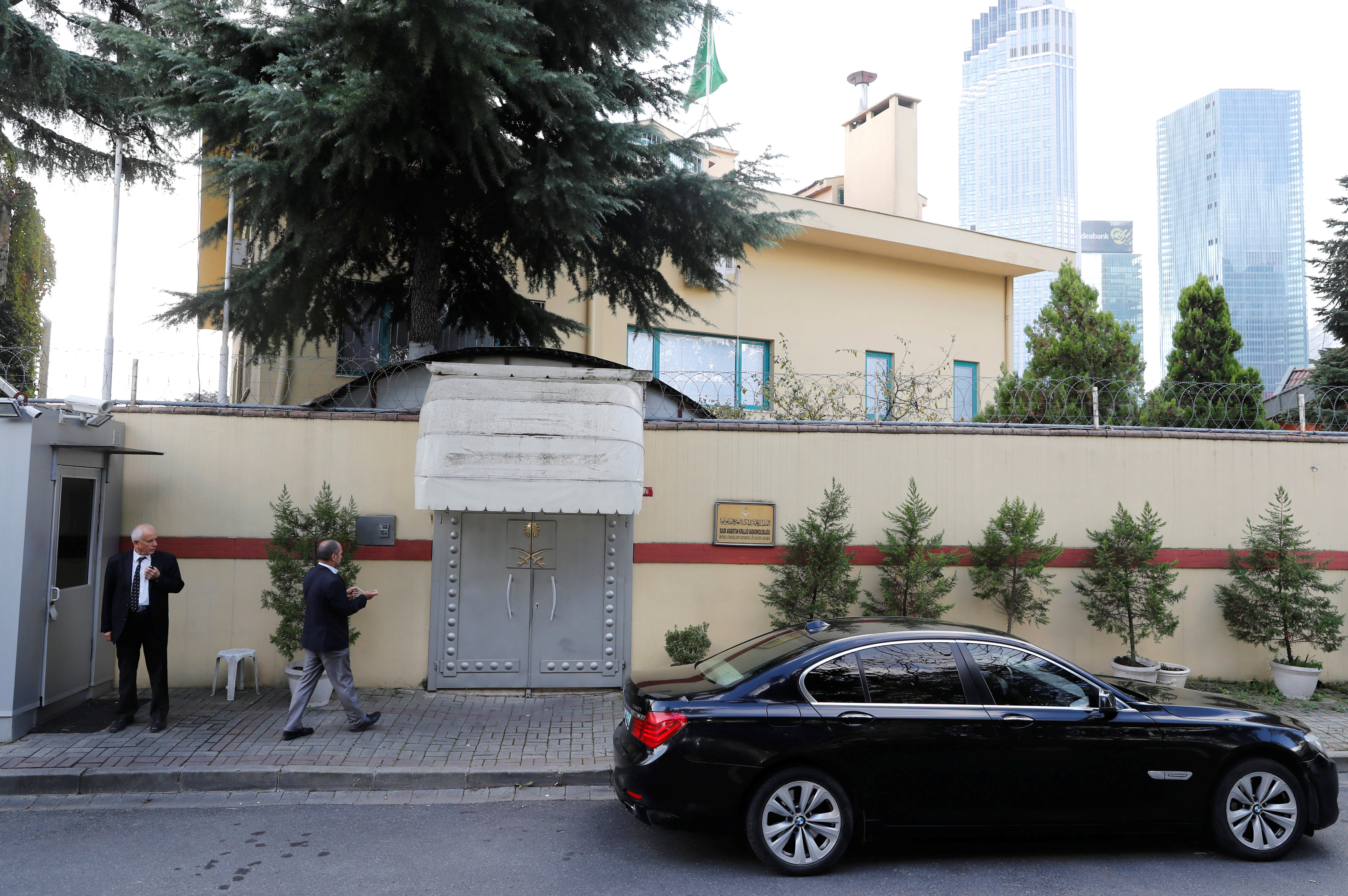 an official walks outside the saudi consulate in Istanbul