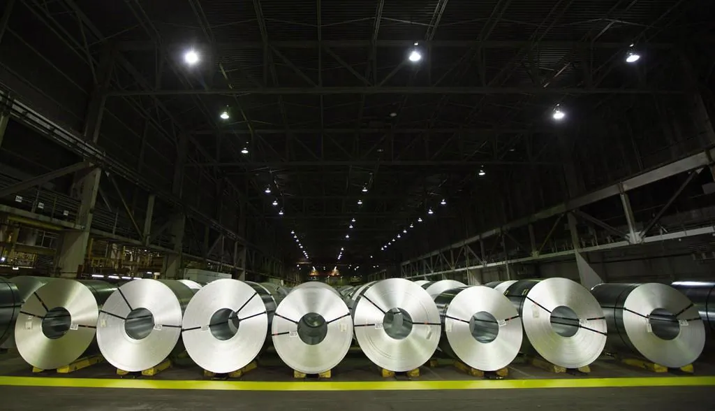 Rolls of coiled coated steel are shown at Stelco in Hamilton in a file photo. (The Canadian Press/Peter Power)