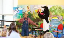 Man and Mascot Cow Spread Kindness to Kids
