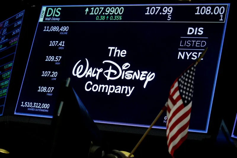 A screen shows the logo and a ticker symbol for The Walt Disney Company on the floor of the New York Stock Exchange in New York on Dec. 14, 2017. (Brendan McDermid/Reuters)