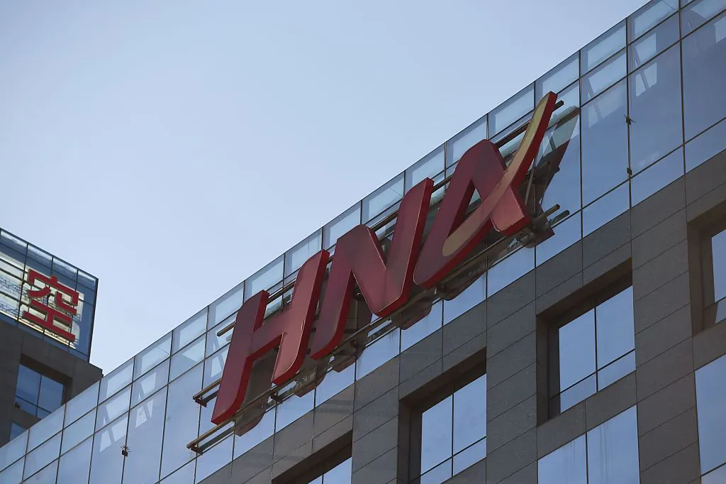 The HNA logo is seen on a building in Beijing on Feb. 18, 2016. (Greg Baker/AFP/Getty Images)