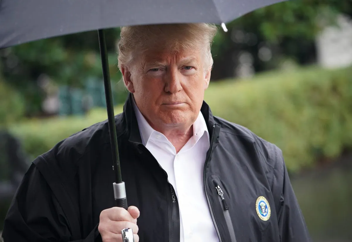 President Donald Trump speaks before boarding Marine One from the South Lawn of the White House in Washington, DC on Oct. 15, 2018. (MANDEL NGAN/AFP/Getty Images)