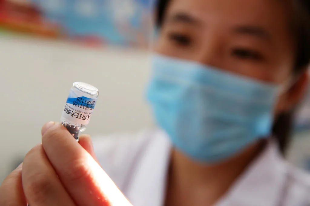 A nurse prepares a rabies vaccination shot at the Disease Control and Prevention Center in Huaibei City, Anhui Province, China, on July 24, 2018. (AFP/Getty Images)