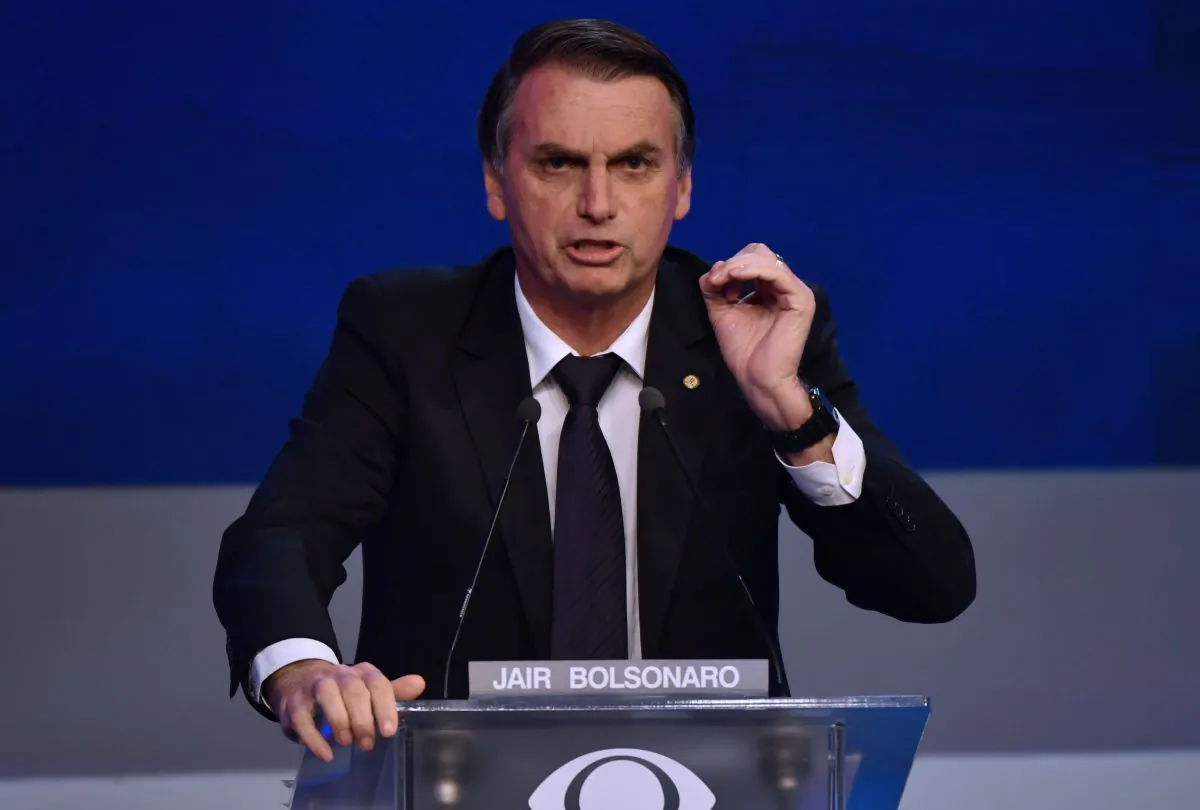 Brazilian presidential candidate Jair Bolsonaro (PSL), speaks during the first presidential debate ahead of the October 7 general election, at Bandeirantes television network in Sao Paulo, Brazil, on August 9, 2018. (NELSON ALMEIDA/AFP/Getty Images)