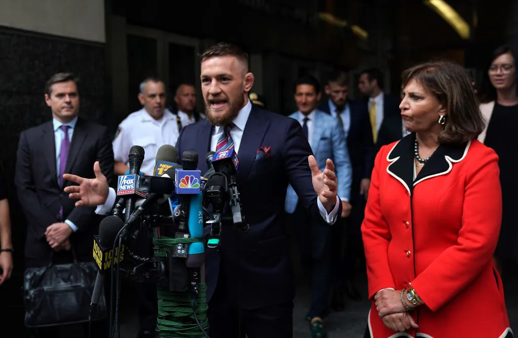 Conor McGregor talks to the press on July 26, 2018, in New York, after he pleaded guilty to a single violation of disorderly conduct after attacking a bus filled with UFC fighters. (Timothy A. Clary/AFP/Getty Images)